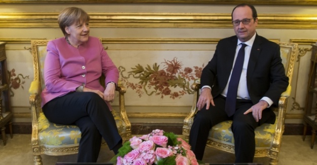 Merkel ve Hollande görüşmeye geçti