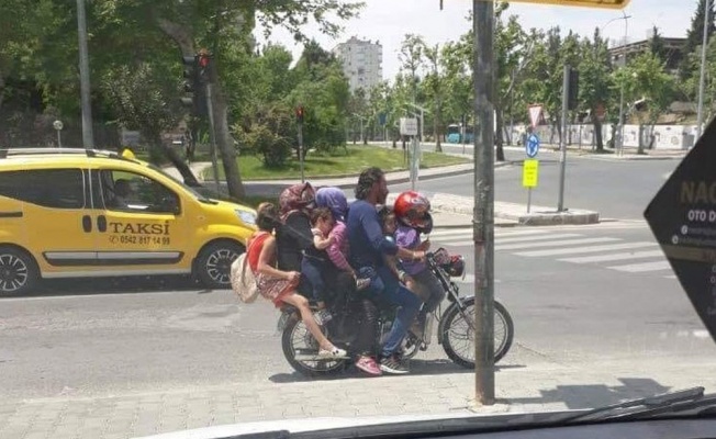 7 kişi bir motosiklette