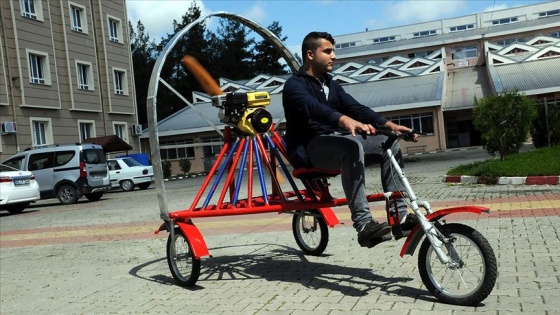 Atıl malzemelerden 'paramotorlu bisiklet'