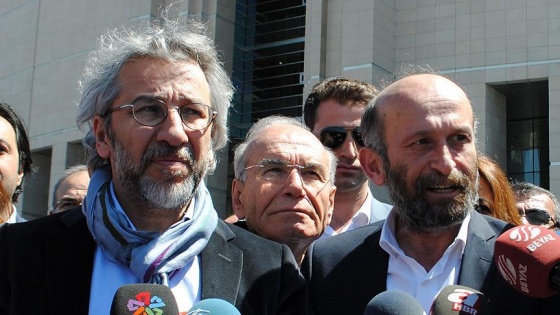 Dündar ve Gül'ün 'terör örgütüne yardım etme' davası başladı