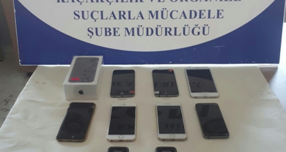 Eskişehir'de 27 şişe kaçak içki ve 10 cep telefonu ele geçirildi