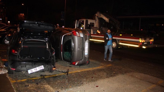 Takla atan otomobil park halindeki otomobilin üzerine düştü