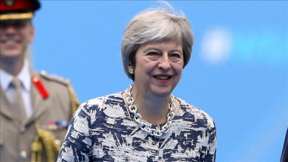 Theresa May'den 'küresel iş birliği' vurgusu