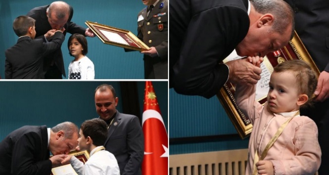 Erdoğan, şehit çocuklarının ellerini öptü