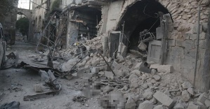 Halep'te fırında ekmek bekleyenleri vurdular
