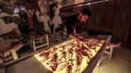 İdlibli sanatçı Suriyelilerin acısını kum taneleriyle anlatıyor