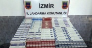 İzmir'de jandarmanın şüphesi kaçak sigaraları yakalattı