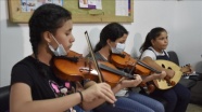 Lübnan&#039;da 73 yıldır mülteci hayatı yaşayan Filistinliler, kimliklerini müzikle korumaya çalışıyor