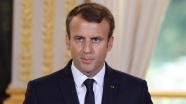 Macron'a 'Esed'in şeref nişanını geri al' çağrısı